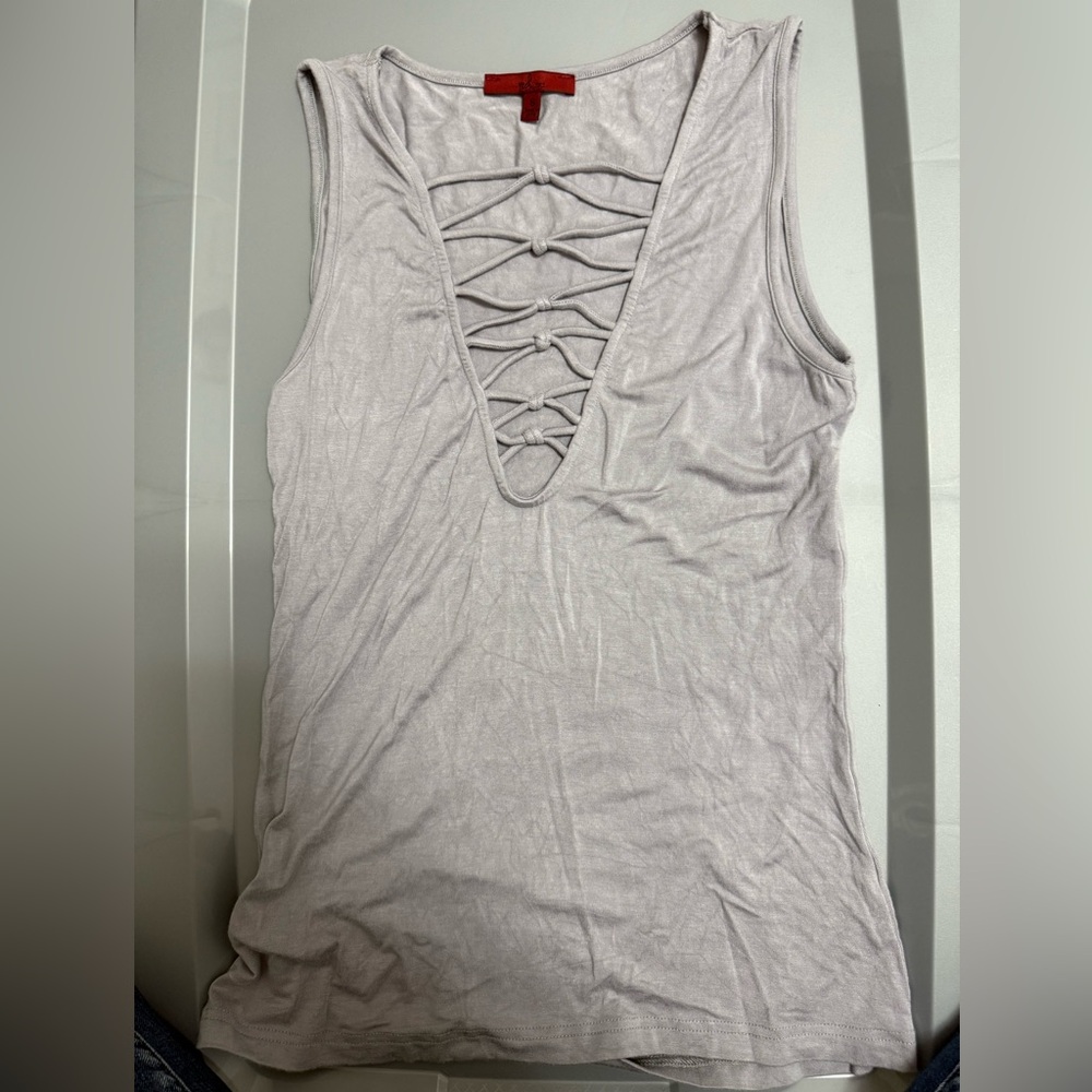 Stylish Sleeveless Top with Unique Front Design